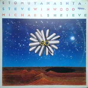 Stomu Yamashta* / Steve Winwood / Michael Shrieve – Go
