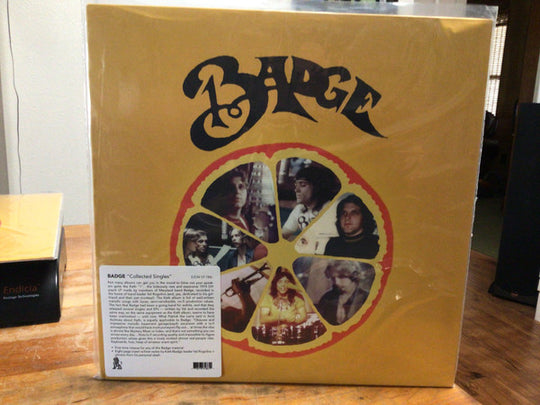 Badge (2) – Collected Singles